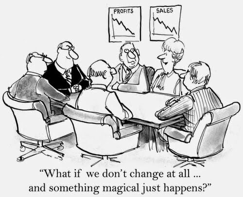A cartoon of a corporate board meeting in which someone asks what if they do not change at all and something magical happens